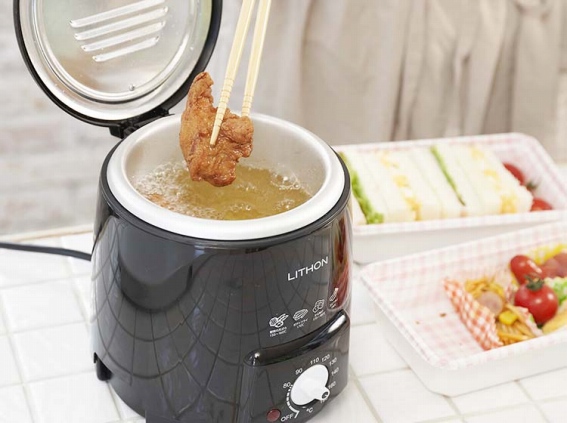 �H��Ŏ�y�ɗg�����Ă�